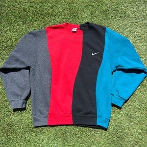 Cut and sew Nike pullover. Grey , red , black , and blue coloring
